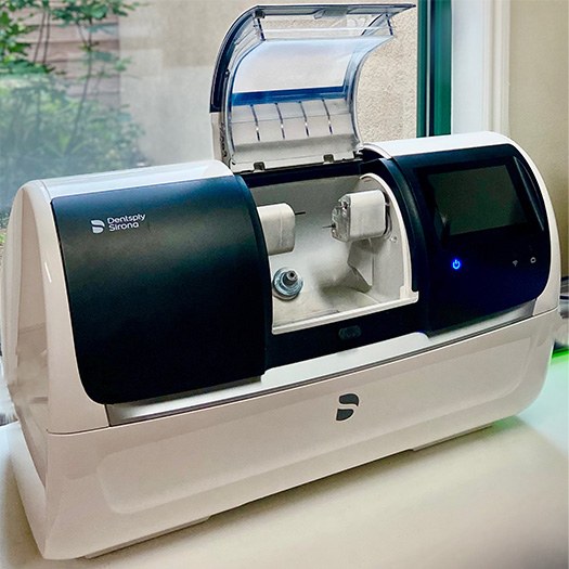 Close-up of dental ceramic inside CEREC milling unit