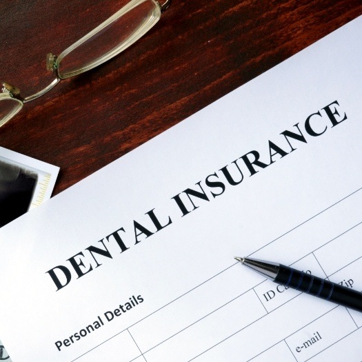 Dental insurance form on desk