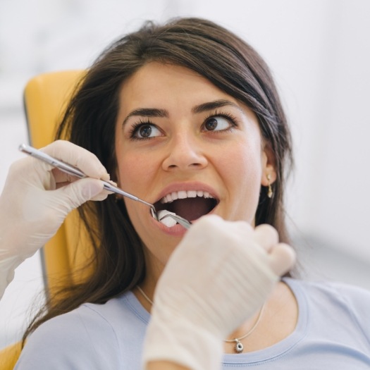 Woman receiving a dental exam