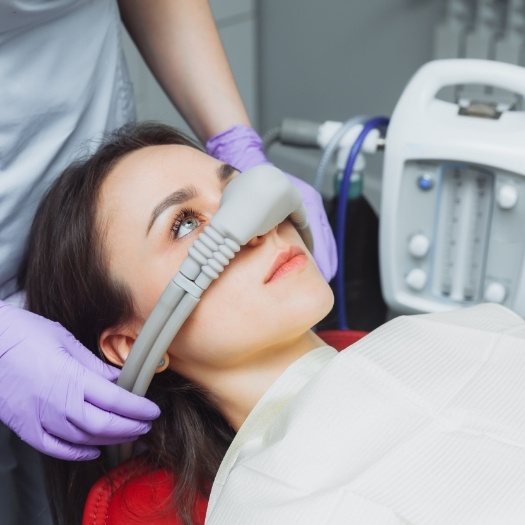 Dental patient with nitrous oxide mask over their nose