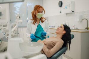 Periodontist and patient having a friendly conversation